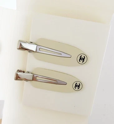 Pinzas para el cabello Chanel blanco cremoso 2 piezas Foto 1 de 3