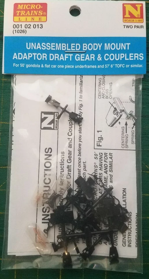 N Scale MICRO TRAINS 001 02 013 (1026) Unassembled Body Mount Adp Draft &Cplers - Image 1 of 1