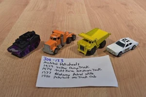 Mattel Hot wheels 2 Trucks, 1 Tank, 1 Police Car(300-123) - Picture 1 of 8
