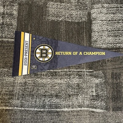 Boston Bruins 2023-2024 Return Of A Champion 2001-Pres Centennial Pennant 12”X5” - Image 1 of 4