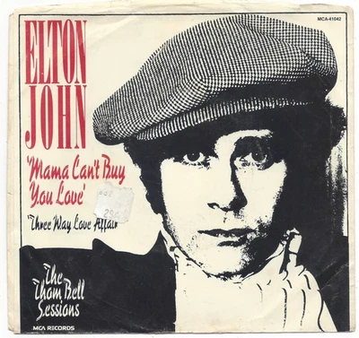 ELTON JOHN, "MAMA CAN'T BUY YOU LOVE" - Image 1 of 4