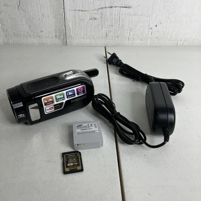 Videocámara Samsung FlashCam SMX-F43BN con memoria flash batería negra, cargador 8 GB SD Foto 1 de 4