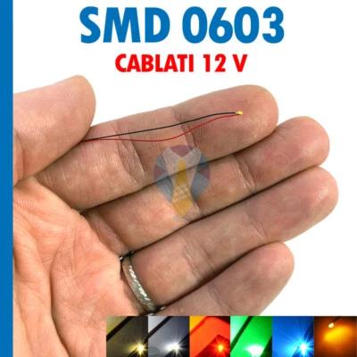 10 PEZZI DIODI LED SMD 0603 12V BIANCO CALDO FREDDO BLUE ROSSO VERDE ARANCIONE - Immagine 1 di 4