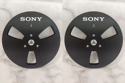 Un par de carretes de cinta Sony de 7"" aluminio negro para carrete a carrete vacío carrete de recogida Foto 1 de 4