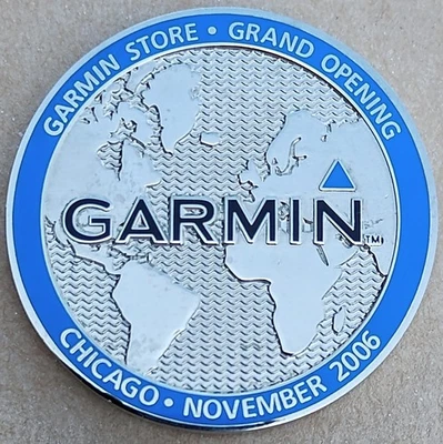 Garmin Store Grand Opening Geocoin (2006) - Activated & Adoptable - TB1A5DH - Image 1 of 2