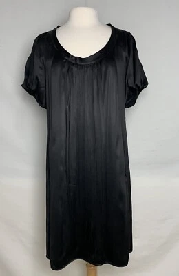 Vestido Miu Miu Talla 40 Negro Sólido Cambio Plisado Con Bolsillos Mangas Abullonadas Foto 1 de 4