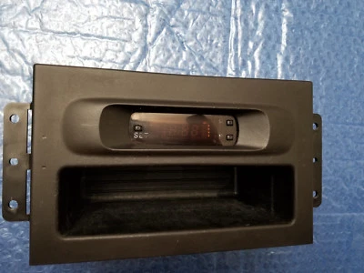 RELOJ MITSUBISHI MONTERO LIMITED 2000-2006 TABLERO CENTRAL CON ADORNO NEGRO OEM Foto 1 de 4