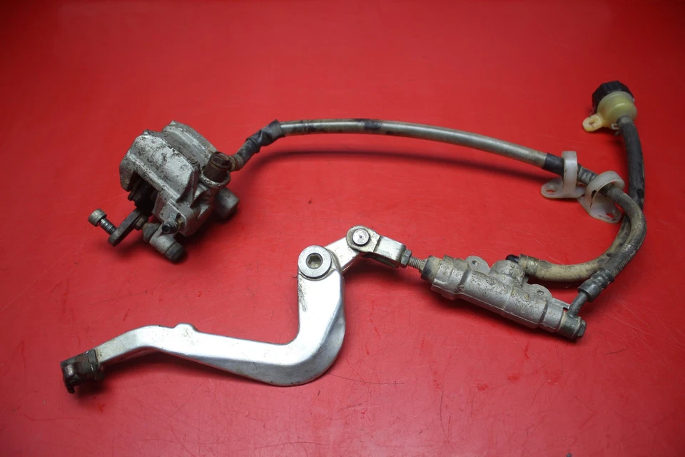 2004 KAWASAKI KX85 REAR BACK BRAKE COMPLETE SETUP   - Image 1 of 4