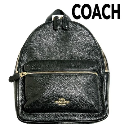 Mini mochila Coach de cuero negro y verde herrajes dorados incluidos en impuestos de importación Foto 1 de 4