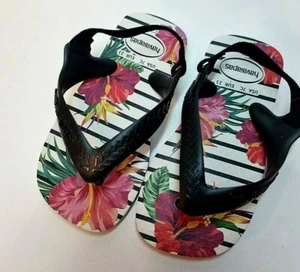 Havaianas filp flop.Neonato UK 6 EU 23.Piede floreale cinturino nero. Schienale elastico. - Foto 1 di 3