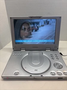 Reproductor de DVD portátil Audiovox D2011 recargable con enchufe de alimentación para automóvil ¡solo FUNCIONA! - Imagen 1 de 12