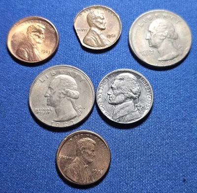 A LOT OF SIX DIFFERENT US MINT ERROR OFF CENTER STRIKES, CLIPS, ETC - Image 1 of 2