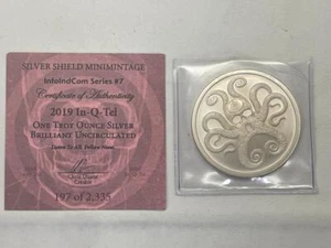 *2019 IN-Q-TEL PLATA 1 OZ ESCUDO MINIMINTAGE REDONDO BU + CERTIFICADO DE AUTENTICIDAD #R879 - Imagen 1 de 7