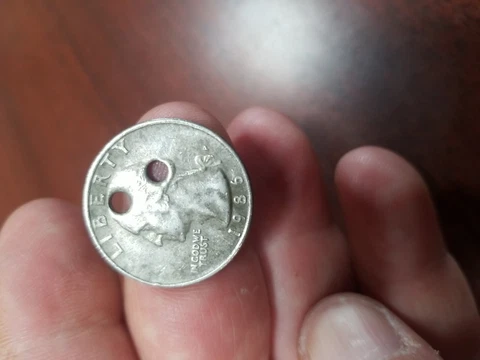 1986 United States Quarter With 2 Holes Cover