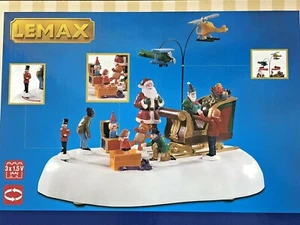 LEMAX JOLLY TOYS WEIHNACHTSMANN ANIMIERTES WEIHNACHTSDORF 2020 - Bild 1 von 3