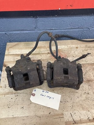 *#58-95-96 Nissan 240sx S14 OEM Par de pinzas de freno delanteras con soporte de montaje Foto 1 de 4