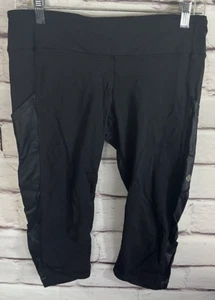 Lululemon Damengröße 8 kurz schwarz Run Pace Capri Leggings mit Taschen - Bild 1 von 4