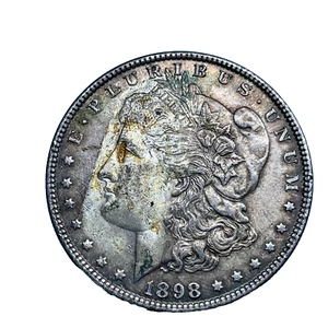 1898 Morgan Dollar Toned, Uncirculated, 90% Silver $1 US Coin # 1947 - Picture 1 of 5