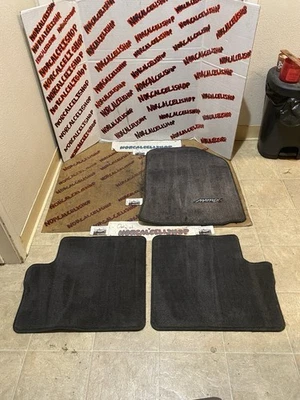 2003-2008 Toyota Matrix OEM Floor Mats Black (3 mats) - Used - Image 1 of 4