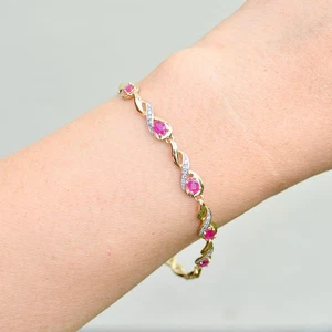 Ruby and Diamond 9ct Yellow Gold Infinity Design Bracelet - Picture 1 of 12