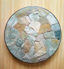 A TABLE CENTREPIECE OF COLOURED SLATE PIECES IN A METAL CASING.  EX COND