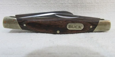 Navaja de bolsillo Buck 373 Trio 3 hojas código de fecha y tonos de madera varían Foto 1 de 3