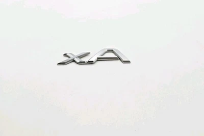 2004-2006 SCION XA MALETERO TAPA EMBLEMA LOGOTIPO INSIGNIA SÍMBOLO LETRAS SIGNO OEM  Foto 1 de 3