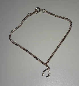 Vtg Avon "Lady Luck" 7-1/8" Goldtone Bracelet Dangling Horseshoe Charm - Foto 1 di 6
