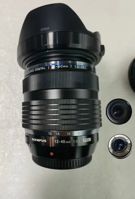 Olympus M.Zuiko Digital ED 12-40mm f/2.8 PRO Lens Near MINT w/Hood - Image 1 of 4