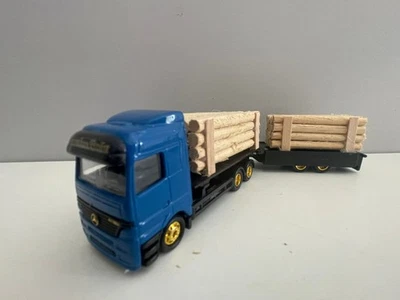Camión Mercedes con carga de madera escala 1/87 HO - Imagen 1 de 3