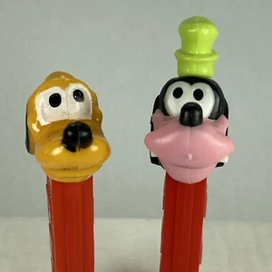 Dispensadores de perros PEZ Pluto 3.9 Austria y Goofy 4.9 Yugoslavia Walt Disney - Imagen 1 de 10