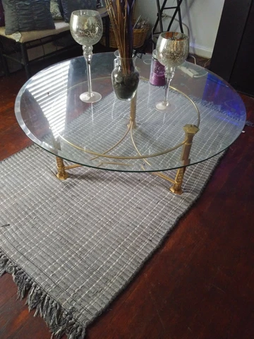 Glass top Table with brass Bass Cover