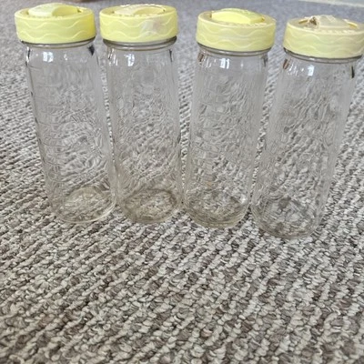 4 biberones de vidrio Hygeia By Ball de colección años 60 en relieve de 8 oz con tapas originales Foto 1 de 4
