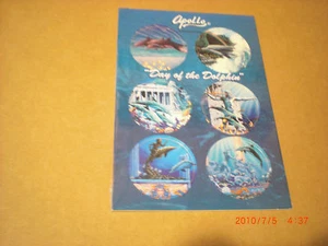 POGS APOLLO (DAY OF the DOLPHIN) STILL ON CARD NICE - Picture 1 of 2