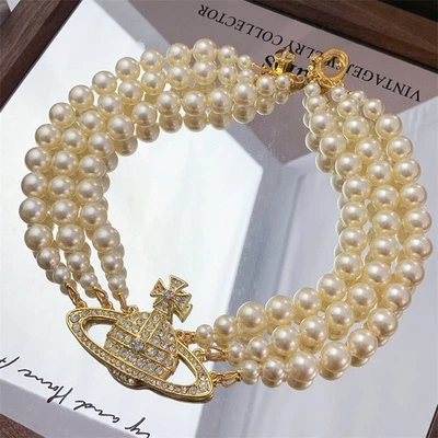 Collar Gargantilla Vivienne Westwood Perla Orbe Triple Capa Dorado Usado Foto 1 de 4