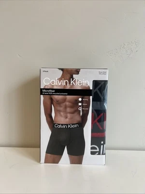 Paquete de 3 pares de calzoncillos boxer de microfibra Calvin Klein rojo gris negro para hombre talla L” Foto 1 de 4