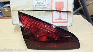 New Genuine Mitsubishi Colt L/H N/S Rear Fog Lamp 05> 8337A055 M64 - Picture 1 of 5
