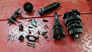 HONDA TRX 350 4X4 1987 ATV > TRANSMISSION + SHIFT DRUM & FORKS # 24300-HA0-003 - Picture 1 of 12