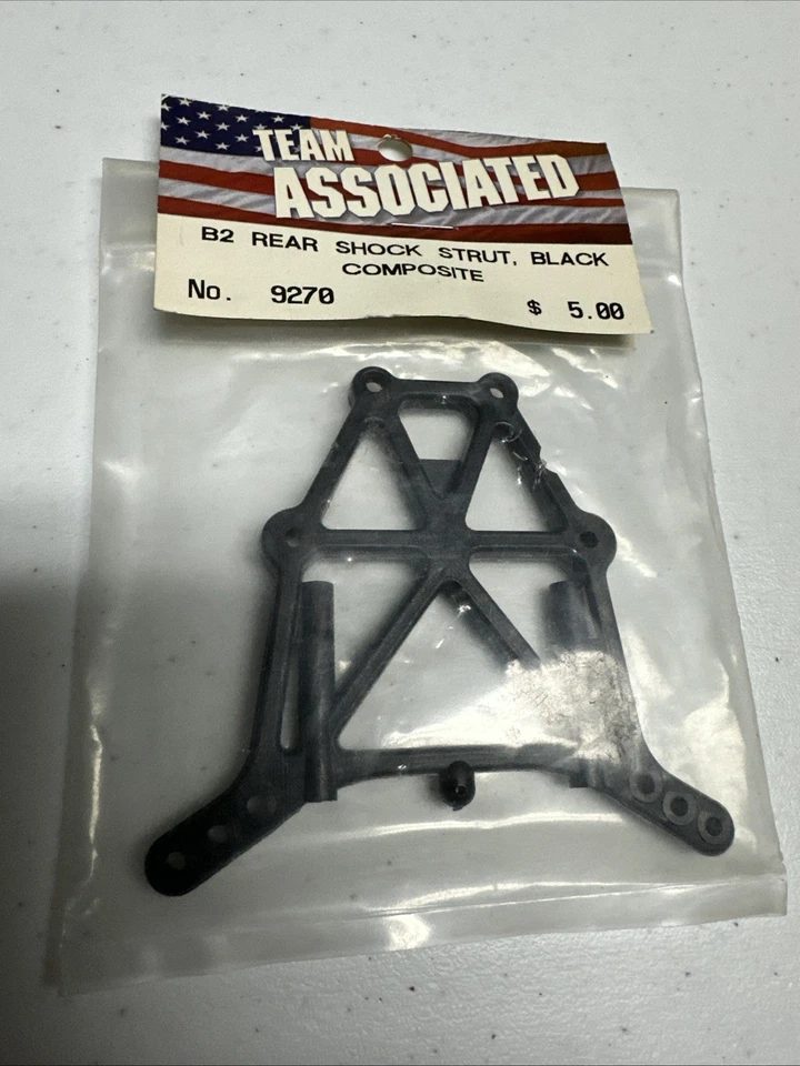 New Vintage Team Associated #9270 RC10B2 REAR Shock Tower  Black Composite NIP - Image 1 of 1