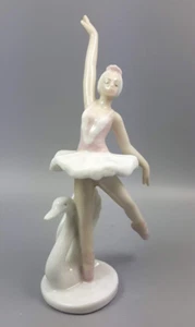 Morena porcellana ballerina con braccioalzato e cigno h 13 cm - Foto 1 di 2