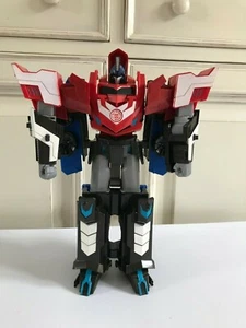 ☺ Transformers Robot Optimus Prime Se Transforme En Véhicule 29 Cm - Foto 1 di 12