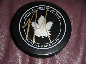 TORONTO MAPLE LEAFS NAZEM KADRI SIGNED 100TH ANNIVERSARY GAME PUCK - Picture 1 of 1