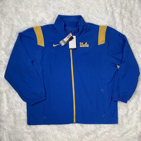 Nike On Field Mens UCLA Bruins NCAA Jacket Size 2XL XXL Blue Gold DN6264 403 Cover
