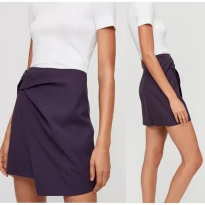 NUEVO CON ETIQUETAS ARITZIA BABATON Jethro Cuadros Imitación Giro Mini Falda Asimétrica Púrpura Talla 6 Foto 1 de 4