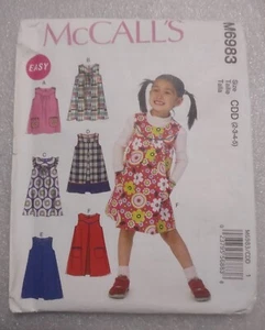 McCall's M6983 Girls Dress & Jumper Pattern 6 Variations Size 2-5 Uncut - Picture 1 of 2