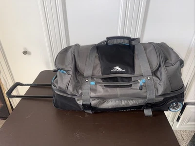 "Lona de lona con ruedas High Sierra 30"" azul y gris buen estado muchas ruedas con mango de habitación" Foto 1 de 4