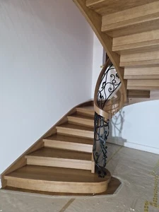 Oak curved staircase with iron from Poland E-Brochure - Picture 1 of 5