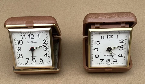 Seth Thomas Travel Alarm Clock For Parts/Repair And Westclox Travel Clock Works Cover