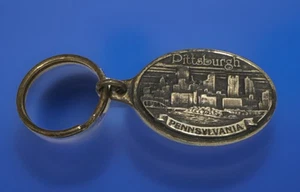 Portachiavi Vintage Pittsburgh PA Skyline Coppertone Souvenir Oro Stella Fotografia - Foto 1 di 5