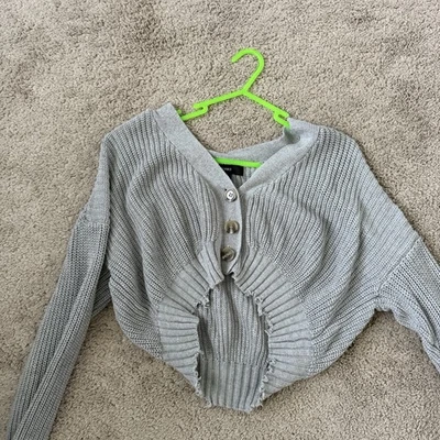 Suéter corto de punto abierto para mujer Foto 1 de 3